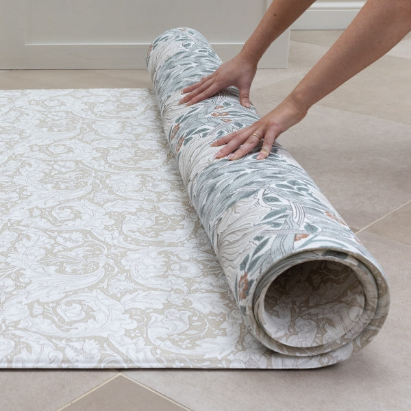 rolled, neutral maximalist floor mat from Morris and Co and Totter and Tumble