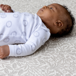 Baby on totter and tumble Acorn play mat from morris & co collection, thick padded playmats supportive for babies and safe from newborn non toxic