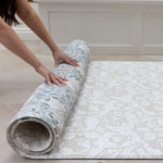 half rolled one piece large padded floor playmat