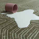 Milk spills on waterproof spielmatte with a stylish sealed surface