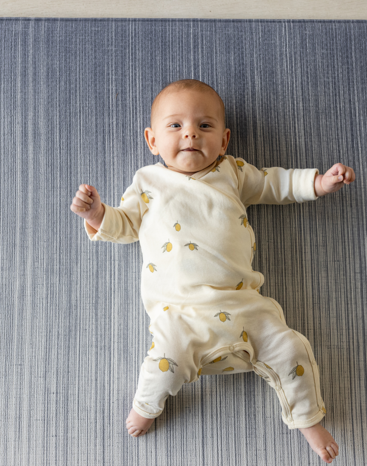 Birds eye view of baby on Kids mats in stylish designs so your family home is beautiful and practical the Kasuri with its beautiful navy blue design is a perfect pick for modern interiors