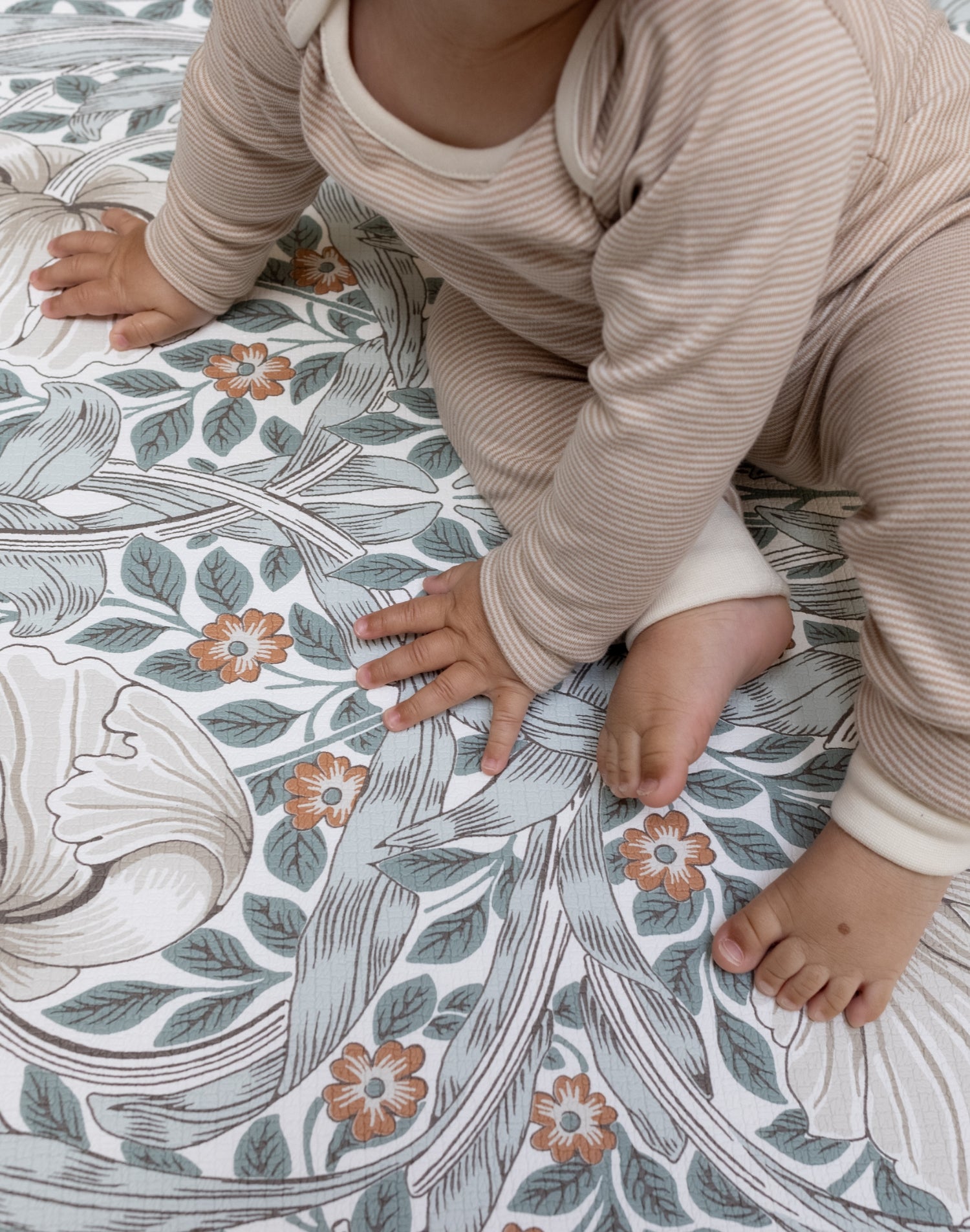 close up of William Morris's Pimpernel design on baby playmat