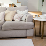 Neutral and modern family space with a chevron play mat that complements the gentle style of the room