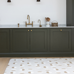 A beige kitchen floor mat that complements modern interior styling 