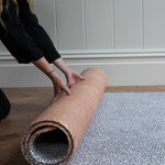 Hands roll out one piece tapis play mat with textured surface and thick memory foam 