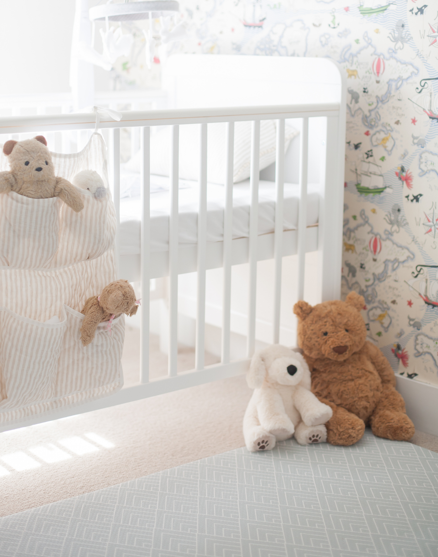 Light grey baby mat with thick padded foam for extra comfort in a child's nursery