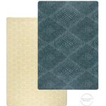 A neutral and soothing double-sided play mat for relaxation