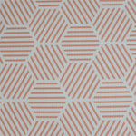 close up of coral hexagon luxury memory foam one piece Totter and Tumble playmat