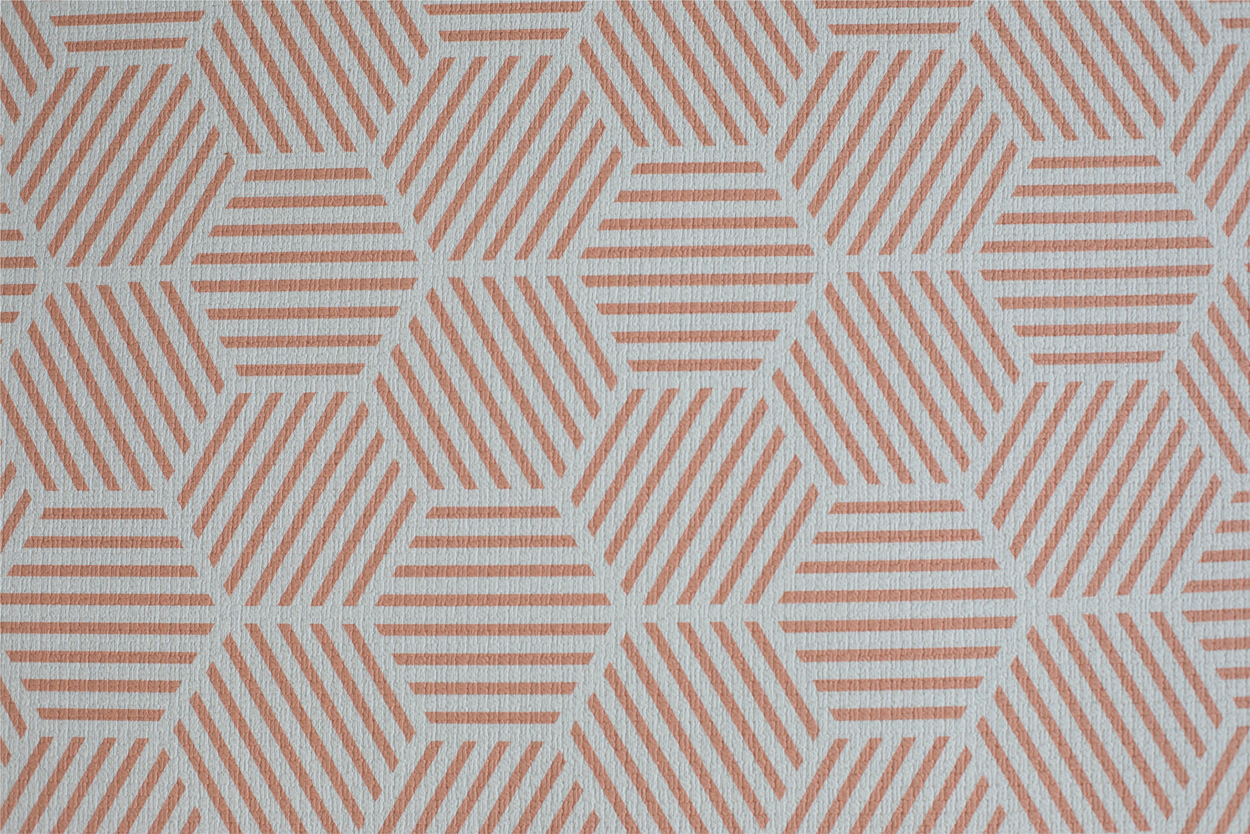 close up of coral hexagon luxury memory foam one piece Totter and Tumble playmat