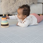 totter and tumble luxury playmats in little Nomad grey chevron design with reversible Dreamer terracotta fun design memory foam playmats for children